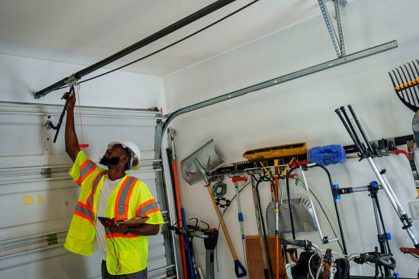 Professional Garage Door Panel Replacement technician working in River Road, OR